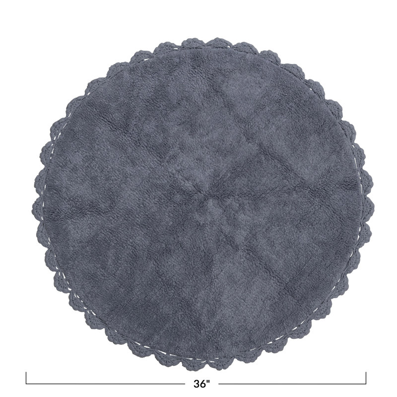 Tapis touffeté en coton avec bordure crochetée et festonnée