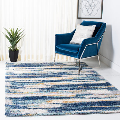 Tapis bleu marine / ivoire à motif abstrait Araya