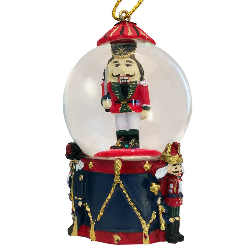 Mini casse-noisette soldat sur tambour globe de neige Warby
