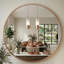 Miroir mural rond en métal Adelina-696271324