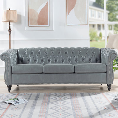 Canapé Chesterfield à accoudoirs roulés 3 places