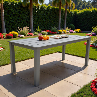 A Wooden-Textured Imitation Wood Dining Table, Simple Yet With A High Quality Feel. It Has A Small Tabletop And Is Perfect For Outdoor Picnics