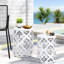 Tables d'appoint blanches en métal (lot de 2), style contemporain avec détails en fer forgé, livrées montées. Décor élégant et moderne. Couleur : [à compléter].