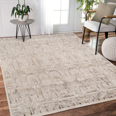 Tapis doré / ivoire en polyester Cadence