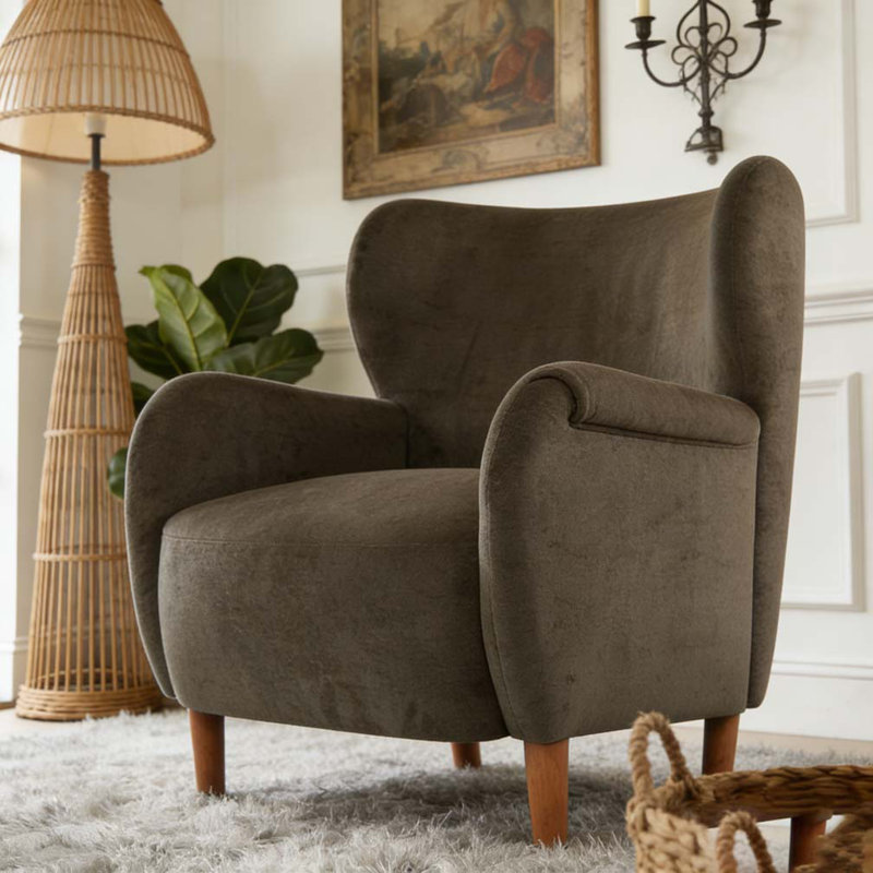 Fauteuil club rembourré à oreilles