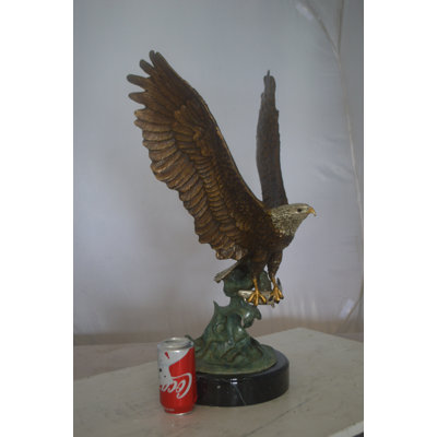 Jenkinson Eagle Catching His Prey from Water Bronze Statue -  Size: 14"L x 13"W x 26"H.