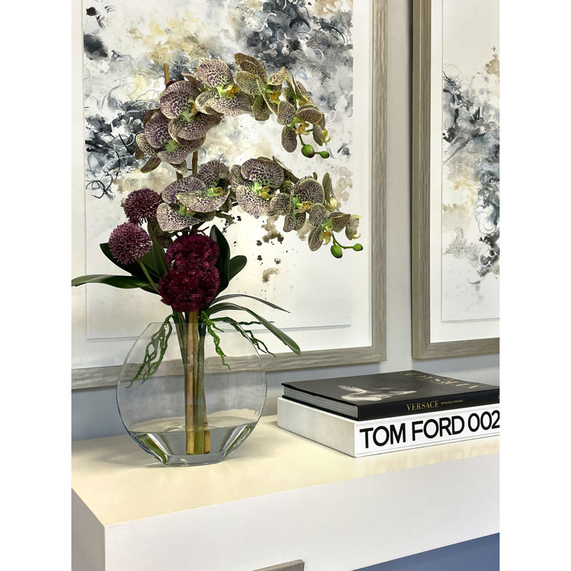 Orchid And Sedum Arrangement In Glass Vase