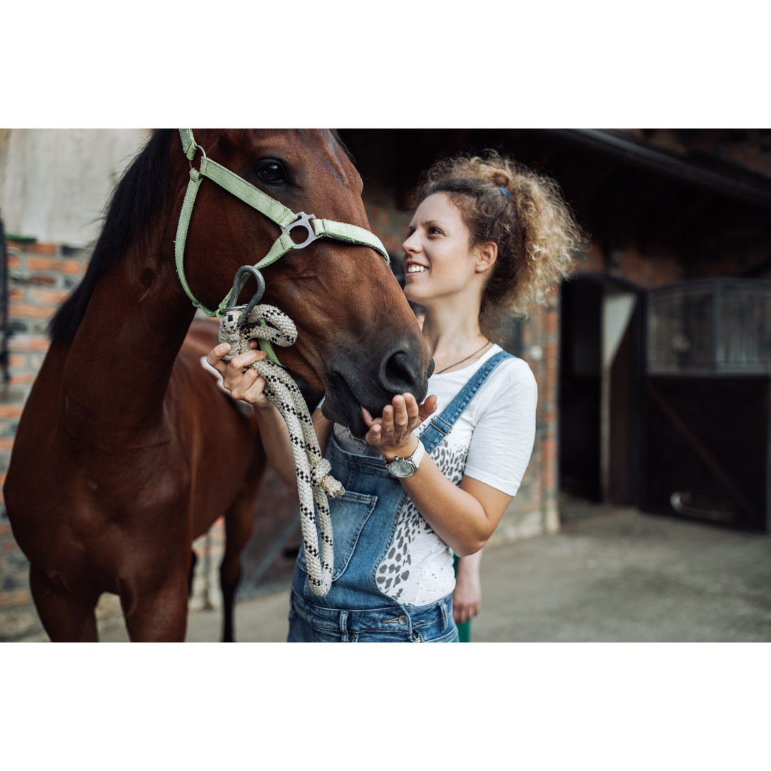 Leinwandbild Woman and Her Horse