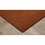 Tapis en laine rouille unie Makhari-1003433150