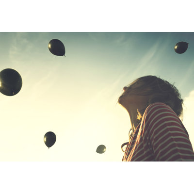 Woman Looking At Balloons by Fcscafeine - Wrapped Canvas Print