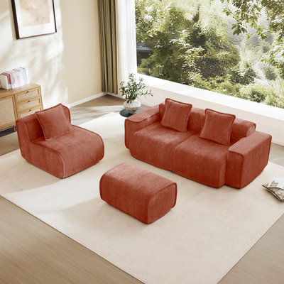 Canapé modulaire spacieux en velours rouge avec confort modulaire, idéal pour un usage domestique