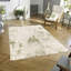 Tapis vert à motif abstrait Luckey-1935801944