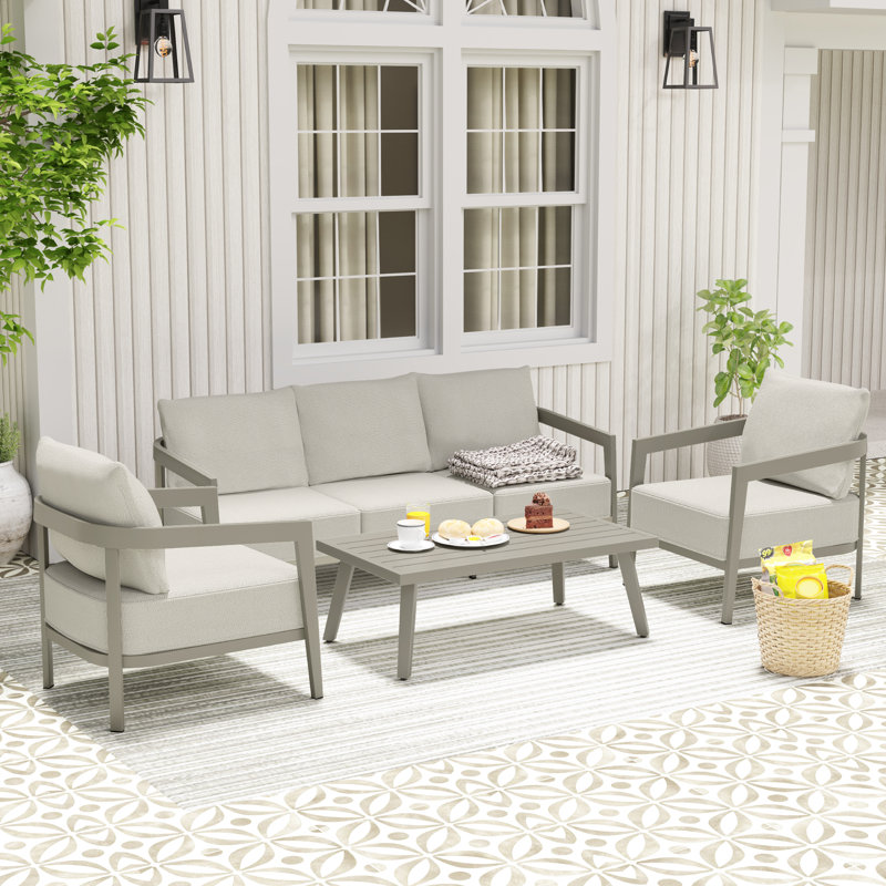 Trombley 4-Piece Aluminum Wicker Patio Conversation Set With 3-Seat Sofa, Coffee Table And Gray Cushions