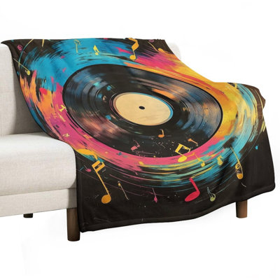 Jeté en vinyle vibrant avec notes de musique en flanelle, jeté doux et chaud pour le canapé-lit du salon