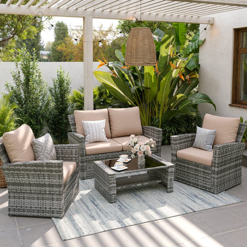 Ensemble de canapé extérieur en résine tressée 4 pièces avec causeuse, siège rembourré et table basse en verre, Beige