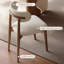 Ensemble de table de salle à manger beige en pierre frittée-113723028