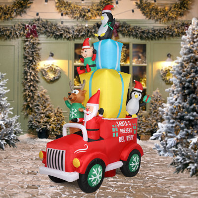 Décoration de Noël à DEL avec père Noël conduisant avec des cadeaux