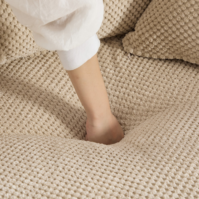Canapé rond surdimensionné sans ossature avec pouf
