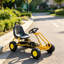 Kart à pédales d'extérieur en noir mat et jaune avec siège réglable, L 35 x l 20,1 x H 21,7