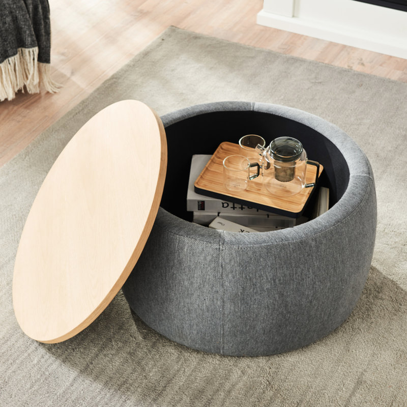 Rangement rond gris foncé - 2 en 1. Agit comme table de bout et siège. Fait à la main. Revêtement en lin. 25,5 po x 25,5 po x 14,5 po. Capacité de 250 lb 1. Fabriqué à la main avec du lin. Supporte 250 lb. Aucun assemblage requis