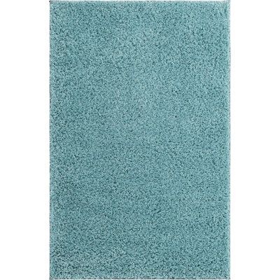 Tapis à poils longs Ashmita de couleur bleu sarcelle