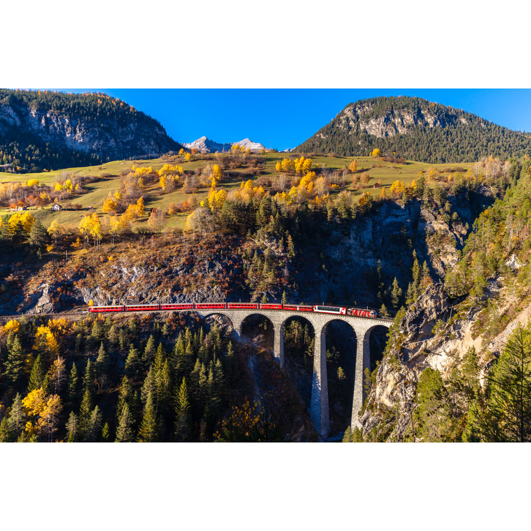 Leinwandbild Train Running on Landvasser Viaduct