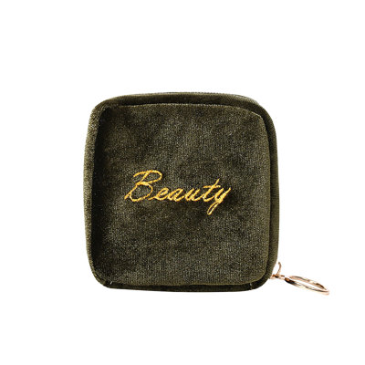 The Zipper Of The Cute And Super Mini Wrist Bag Contains The Lipstick