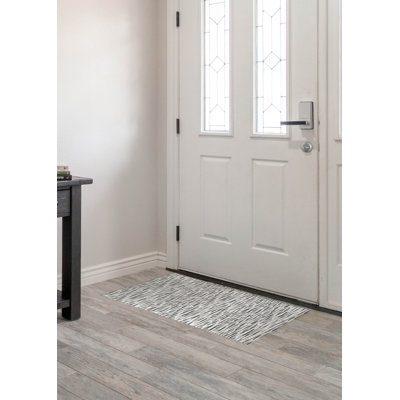 Spectrum Strands Peach Indoor Doormat