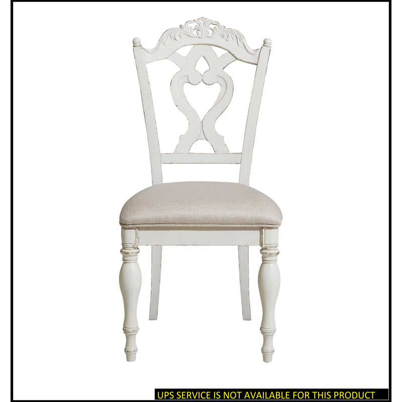 Élégante chaise d'appoint rembourrée avec coussin moelleux, parfaite pour les expériences culinaires confortables et élégantes.