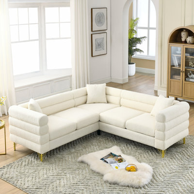 Large 81.5-Inch Corner , L-Shaped 5 Sectional For Living Areas. Modern Streamline Design With Tender Curves And Horizontal Streaks. Construction Solid Wood Metal Legs. 3 Cushions Pillows. Fabric