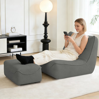 Grand pouf poire en mousse mémoire de forme avec repose-pieds et canapé de sol relaxant en fausse fourrure pour adultes, gris foncé