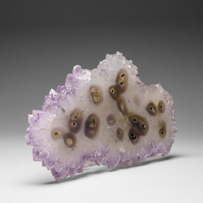 Améthyste, tranche de stalactite d'Urssia (263,8 grammes)