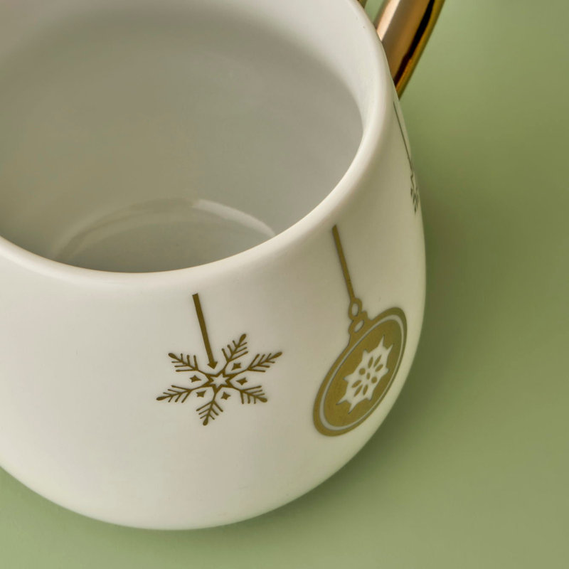 Tasse en porcelaine dorée Frost