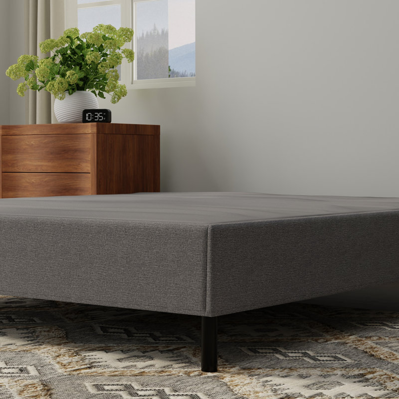 Base de lit rembourrée en noir et gris, conçue pour les configurations de matelas standard, installation simple, structure à taille de poids élevée, matelas A, offre un soutien solide, pratique