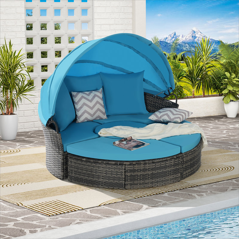 Lit de jour d'extérieur pour terrasse avec auvent rétractable, coussins moelleux et table de rangement pour les loisirs dans la cour arrière