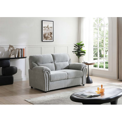 Causeuse confortable et élégante avec un design intemporel pour la détente, les conversations et une ambiance chaleureuse