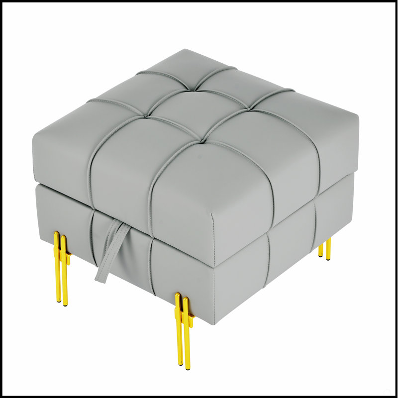 Repose-pieds rectangulaire capitonné en cuir rembourré avec des bords lisses et une conception compacte pour le confort et l'efficacité de l'espace