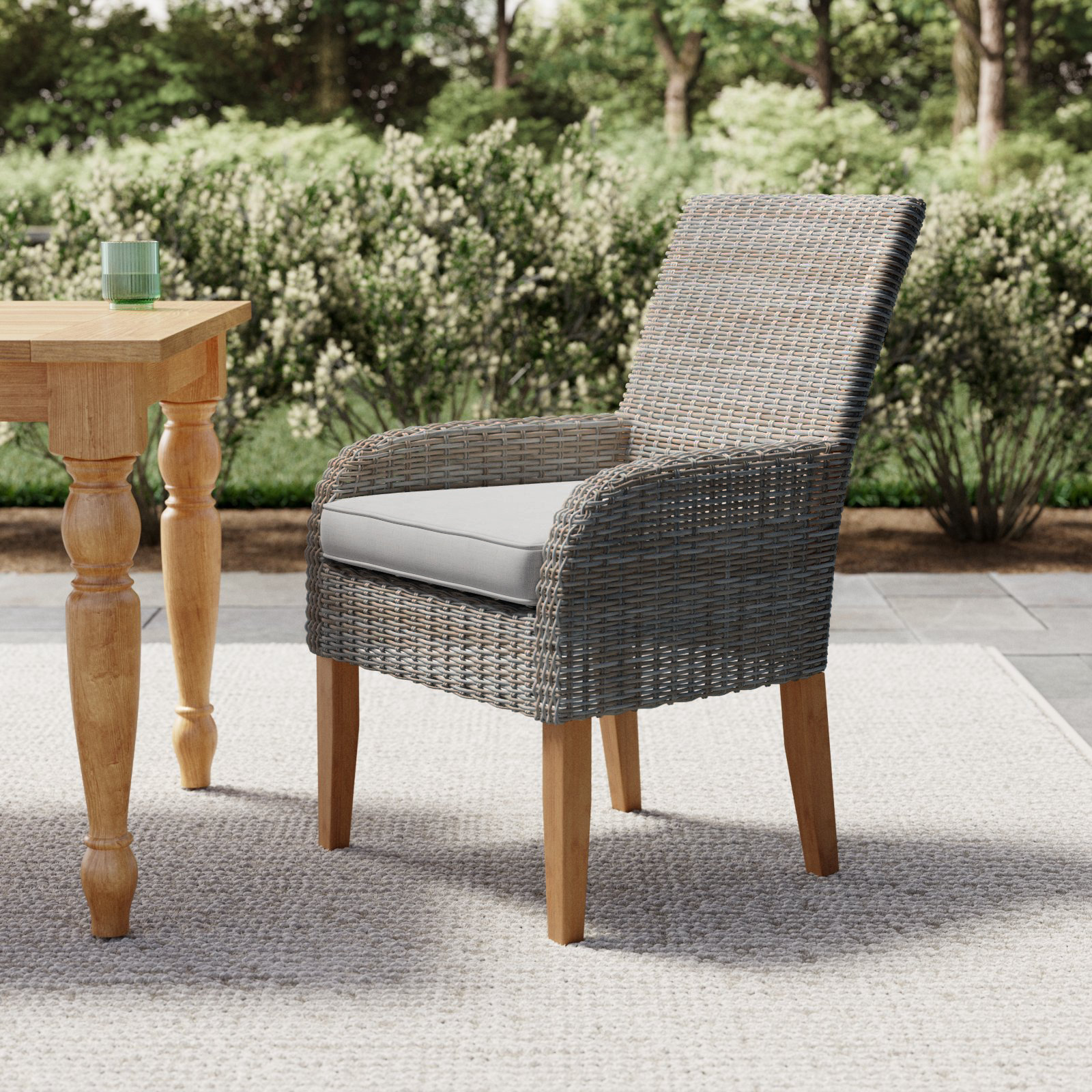 Akiva Wicker Premium All-Weather Wicker Outdoor Dining Armchair with Sunbrella® Cushion