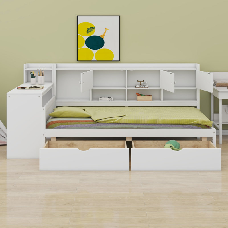 Lit de jour en L peu encombrant, armoires de rangement, tiroirs de rangement sous le lit, bureau d'étude intégré, tablettes intégrées