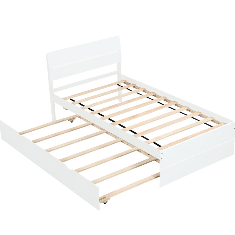 Lit simple moderne avec accents blanc crème et lit gigogne élégant