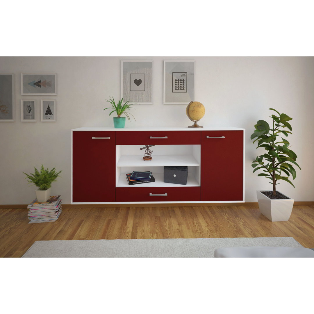 Das Sideboard Mussab hat Metallgriffe. Es hat die Maße 180 cm x 79 cm x 35 cm.