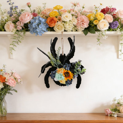 Couronne d'araignée noire Spooky Chic ornée de tournesols et de fleurs assorties - décoration de porte parfaite pour Halloween