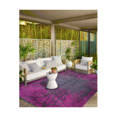Tapis rose lavable à la machine