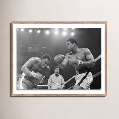 Adom "Muhammad Ali Punching Joe Frazier" Print