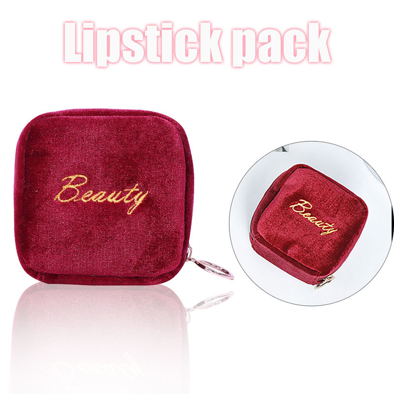 La fermeture à glissière du mignon et super petit sac de poignet contient du rouge à lèvres, Red