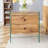 Double-drawer bedside table. The board surface is MDF with wood grain sticker, and both sides are transparent tempered glass. The design is simple and elegant, with excellent storage functions.