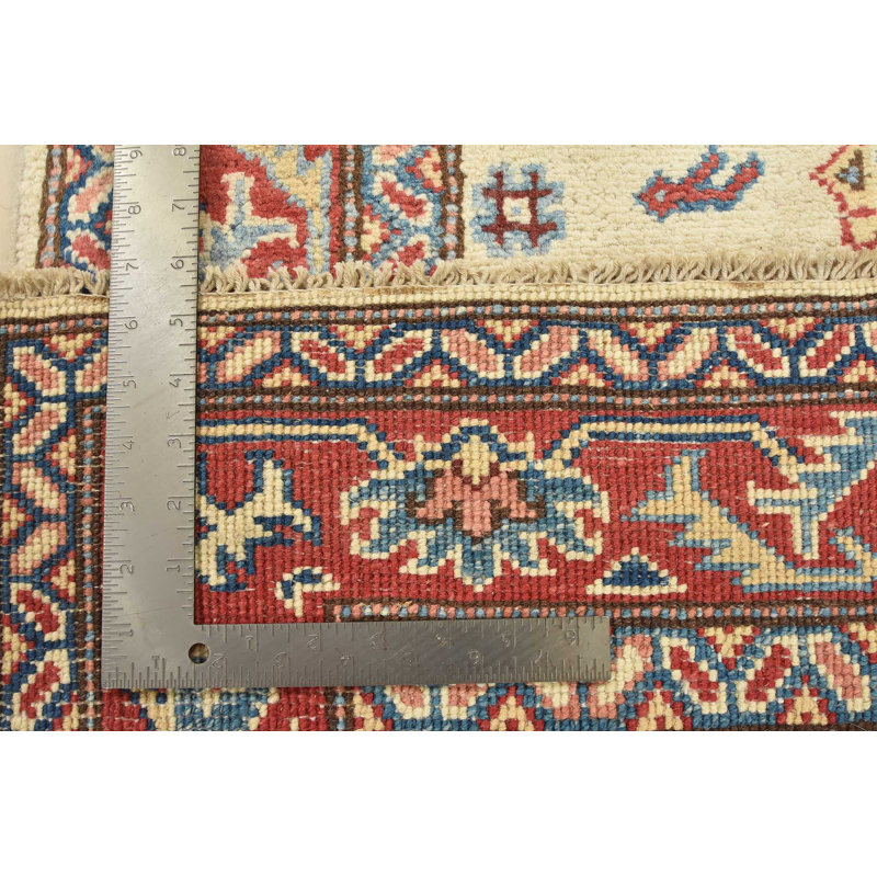 Tapis beige unique de 2 pi 9 po x 9 pi 8 po