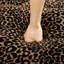 Repose-pieds en chenille léopard-960378732