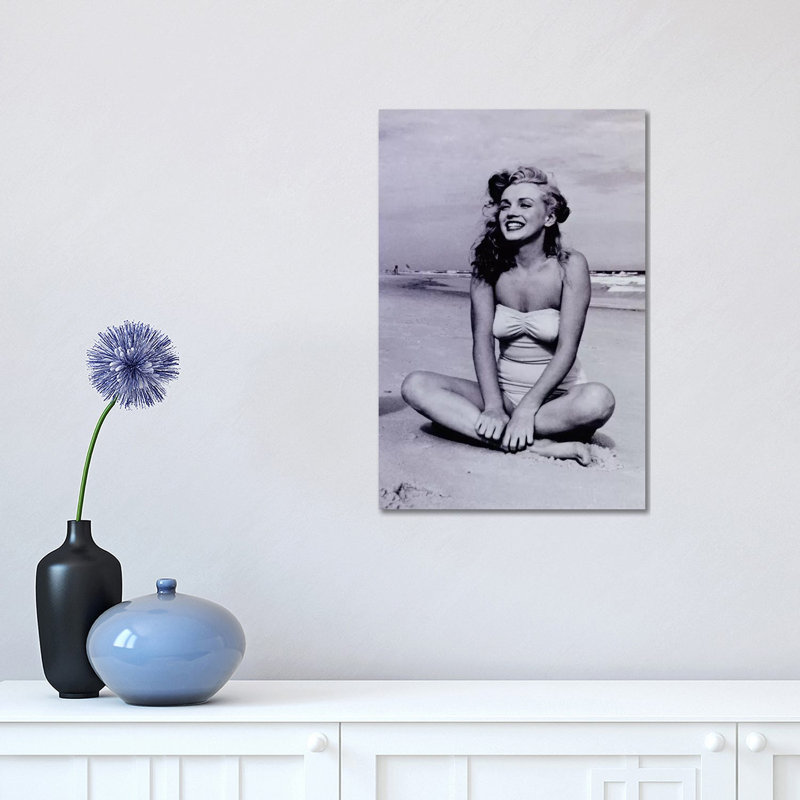 A Young, Smiling Marilyn Monroe Sitting on the Beach by Radio Days - Photograph Print on Canvas, 30.48 cm H x 45.72 cm W