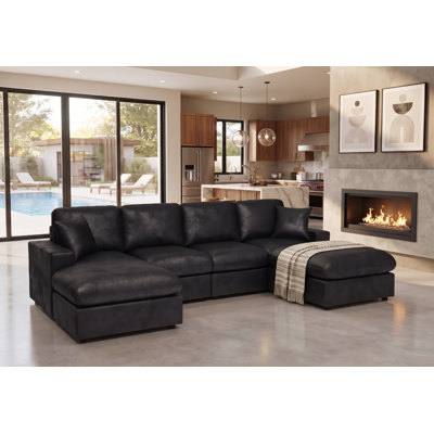 Sofa de coin Mountster avec deux poufs